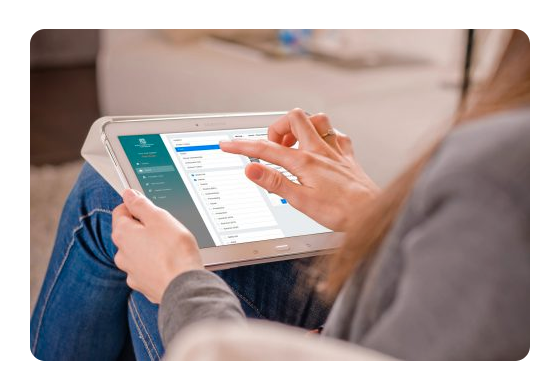 parent using tablet to book music tuition